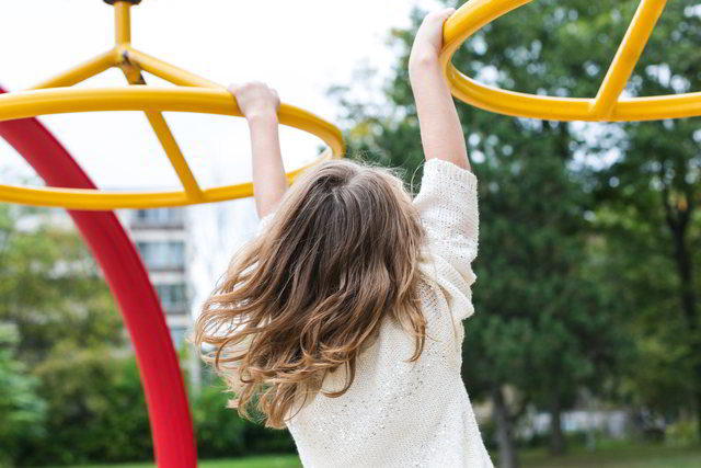 empathy - little girl playing on the playground