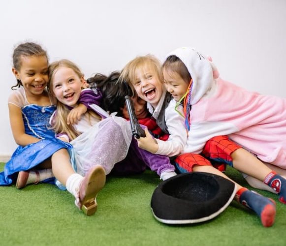 kids playing and singing nursery rhymes